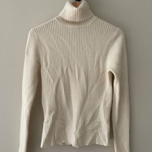 Cream cashmere turtleneck sweater